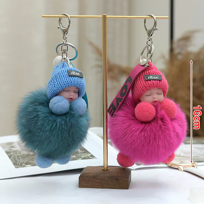 Pompom Sleeping Baby Keychain  - Baby Sleep Sack avis et prix
