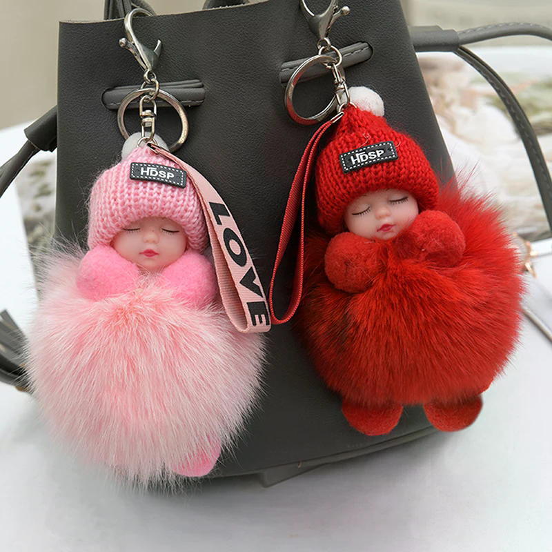 Pompom Sleeping Baby Keychain  - Baby Sleep Sack avis et prix